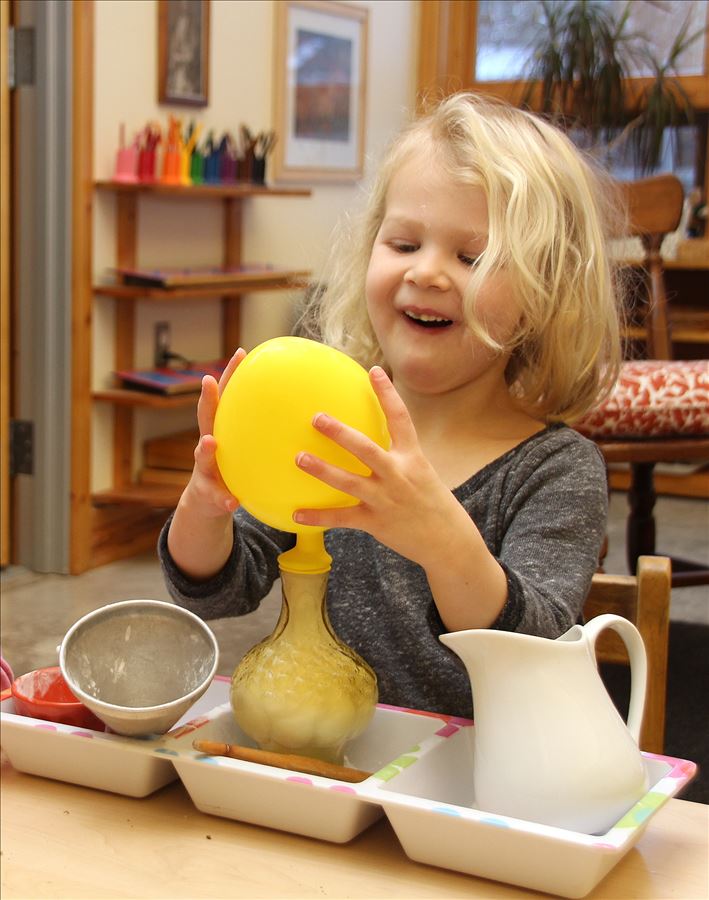 Primary student conducting a science experiment