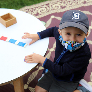 Boy with Montessori color cards